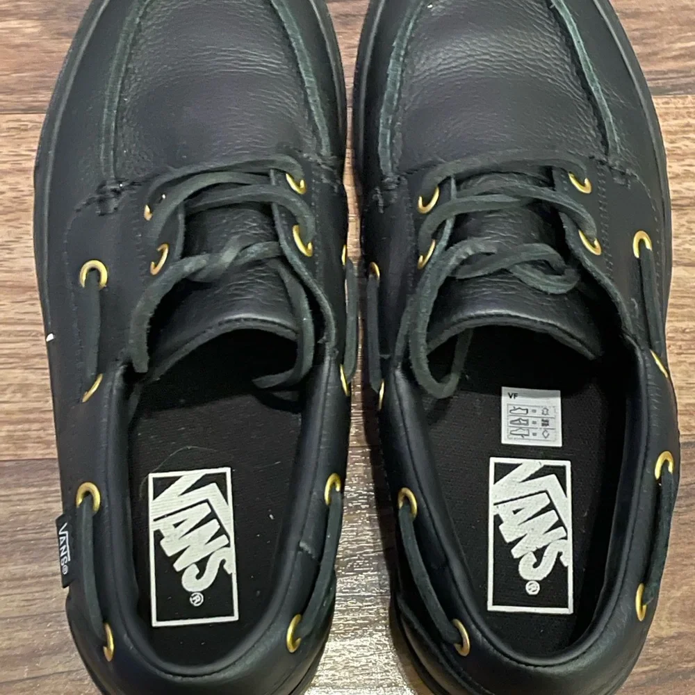 Vans Black Leather Unisex Boat Shoe with Gold Eyelets